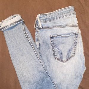 Very distressed cuffed skinny jeans